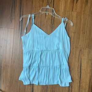 The impeccable pig blue flowy tank top